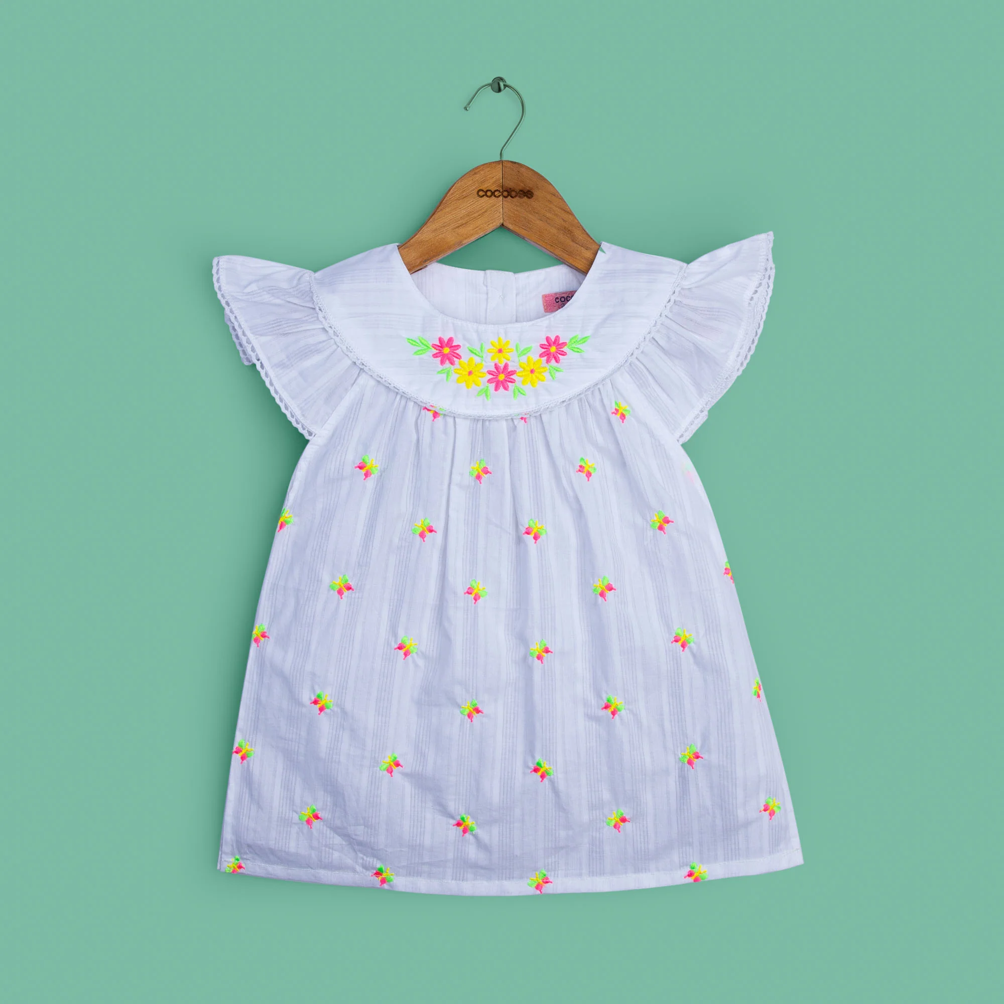 Modish White Embroidered Top